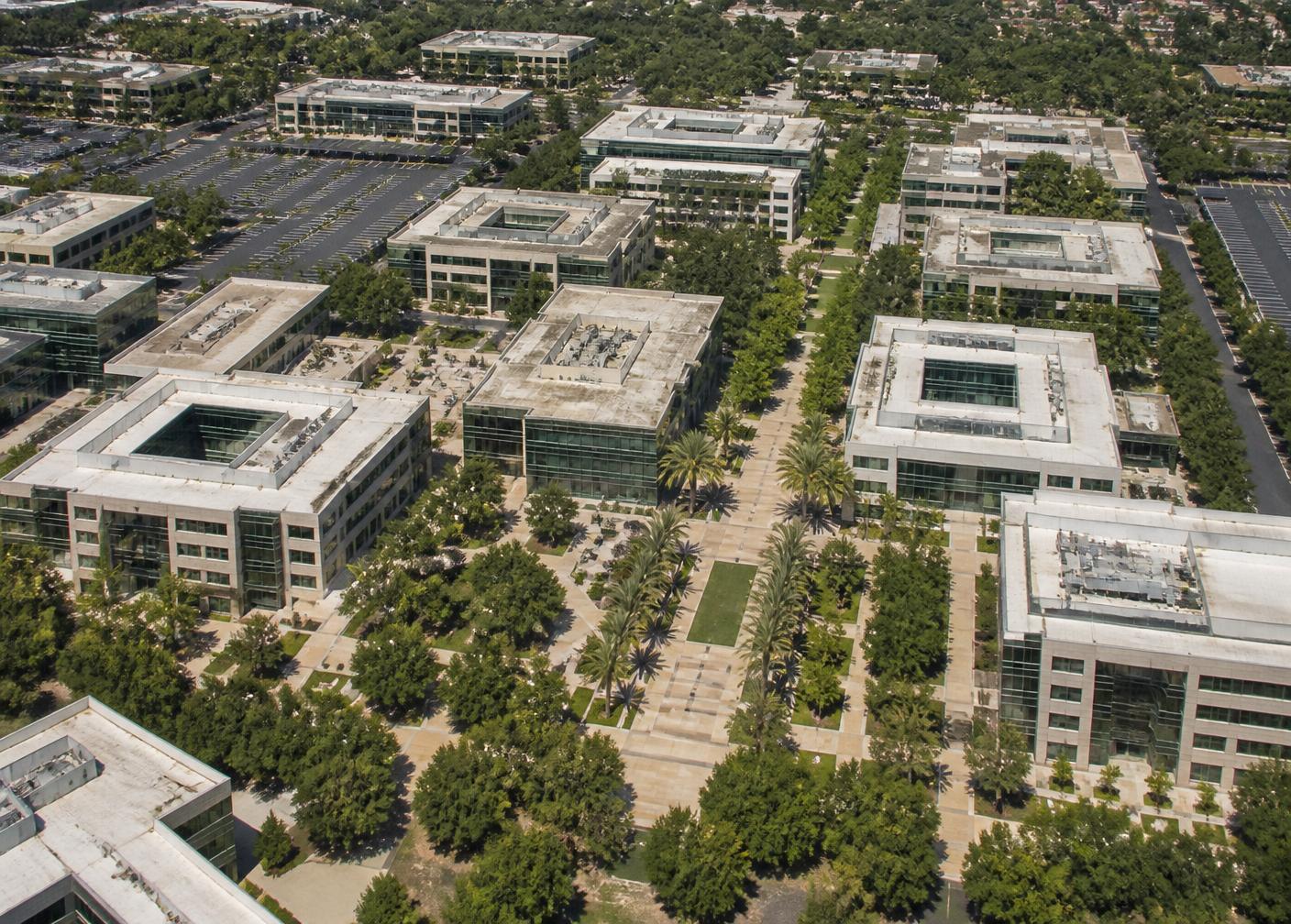Aerial view of a Silicon Valley office campus district, used for the broker review directory
